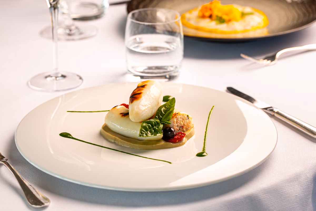 Come preparare calamari ripieni con ricotta, pomodorini e melanzane