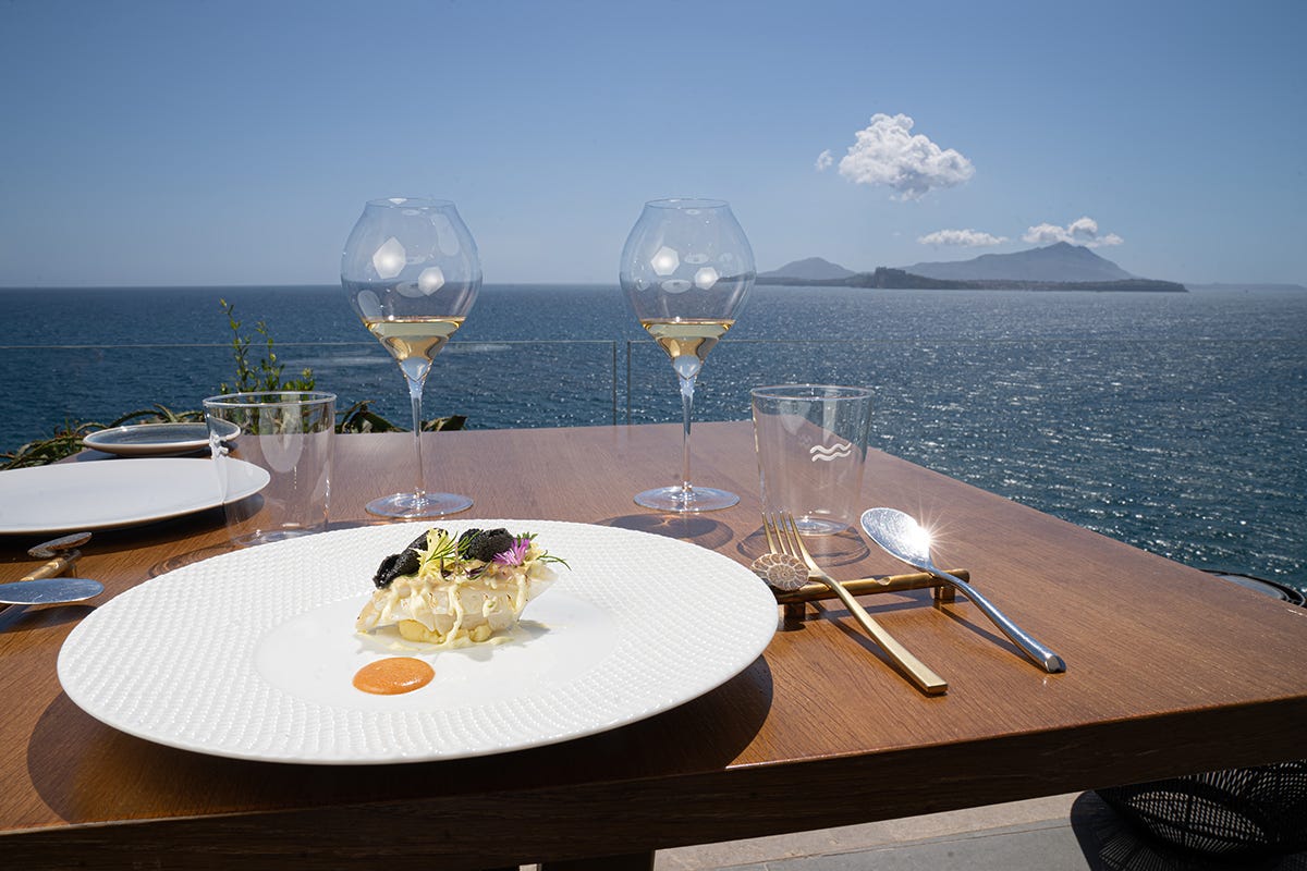 Calamaro, chorizo e patata all'olio. Foto: Luca Bylon Un tavolo sul mare: benvenuti al Caracòl Gourmet di Bacoli