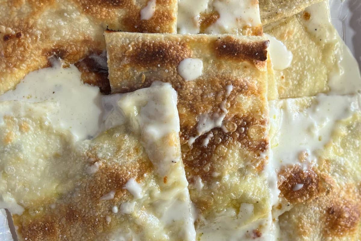 Focaccia di Recco con il formaggio, quando il legame col territorio è una risorsa