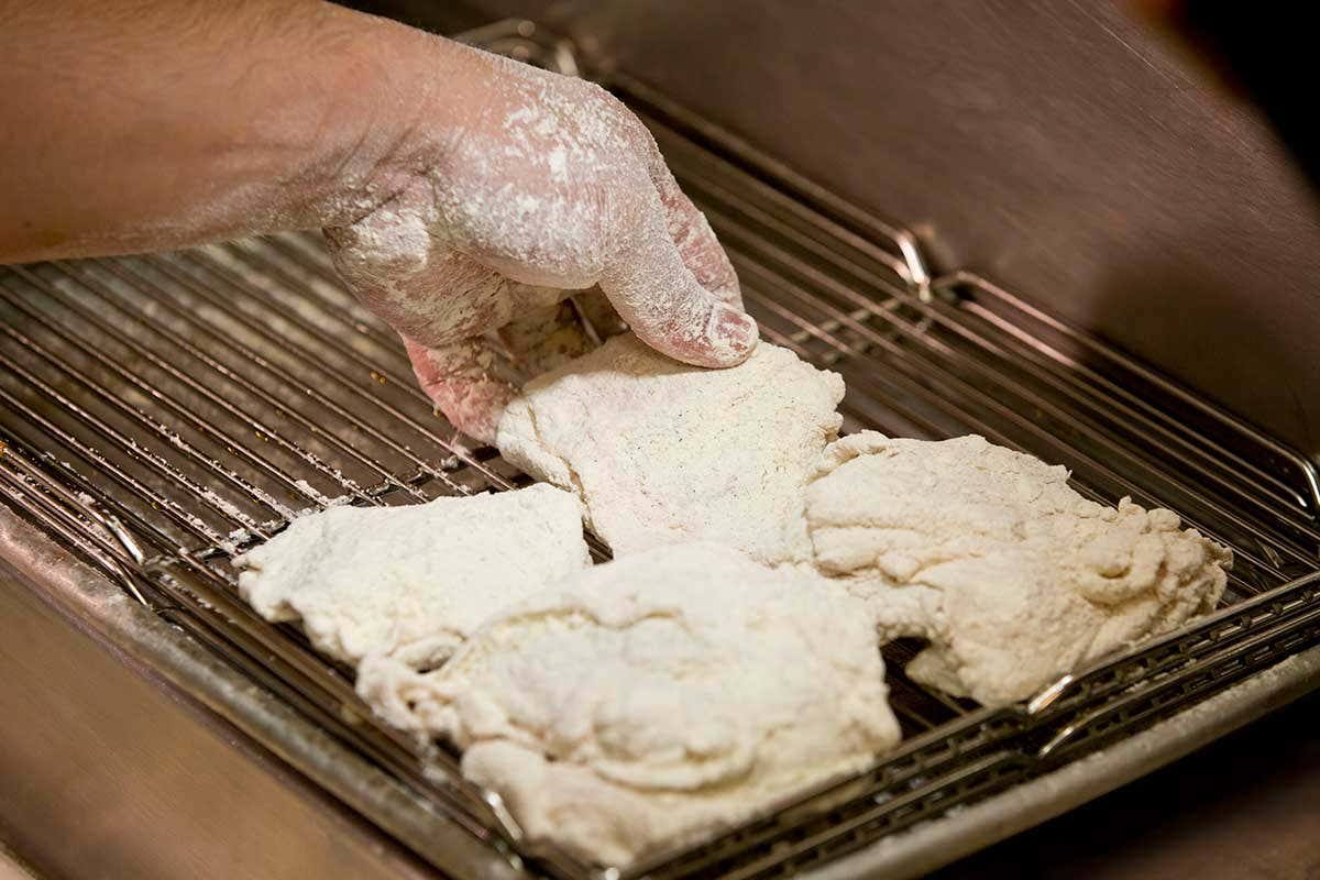 Il segreto del successo? La ricetta segreta della panatura Kentucky Fried Chicken apre le porte delle proprie cucine fast food