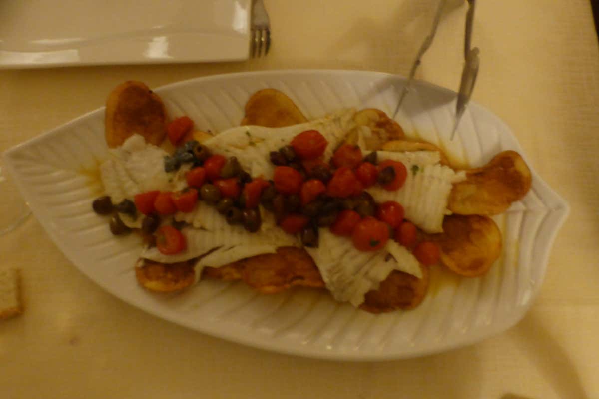 Rombo al forno su letto di chips croccanti Osteria dei Poeti, Cesare Sermoneta illumina i piatti di un ristorante Top