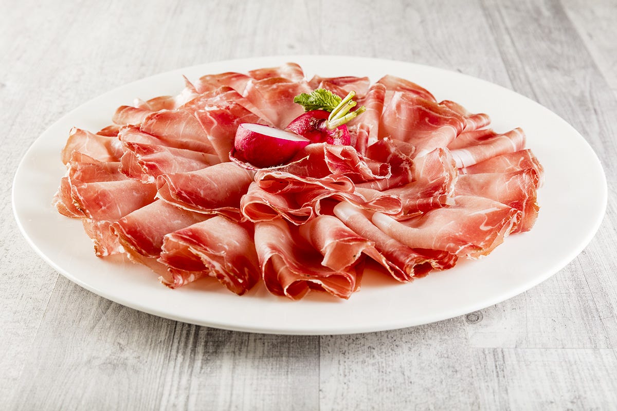 Lo Speck Alto Adige Igp è un alimento dalla grande versatilità in cucina Speck Alto Adige Igp: il Consorzio festeggia 30 anni di tutela