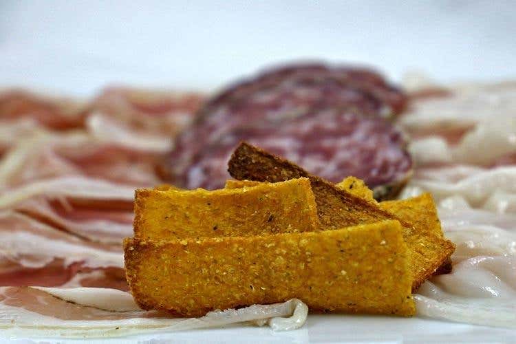 Tagliere (Lalimentari, un secolo di tradizione 
dove design e cucina dialogano fra loro)